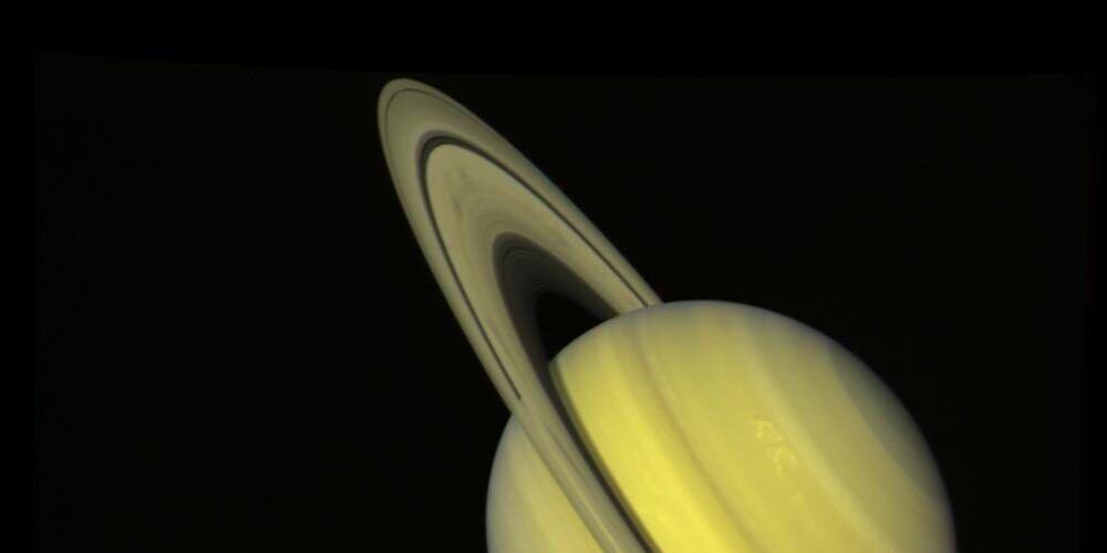 Saturn With Rhea and Dione (True Color)